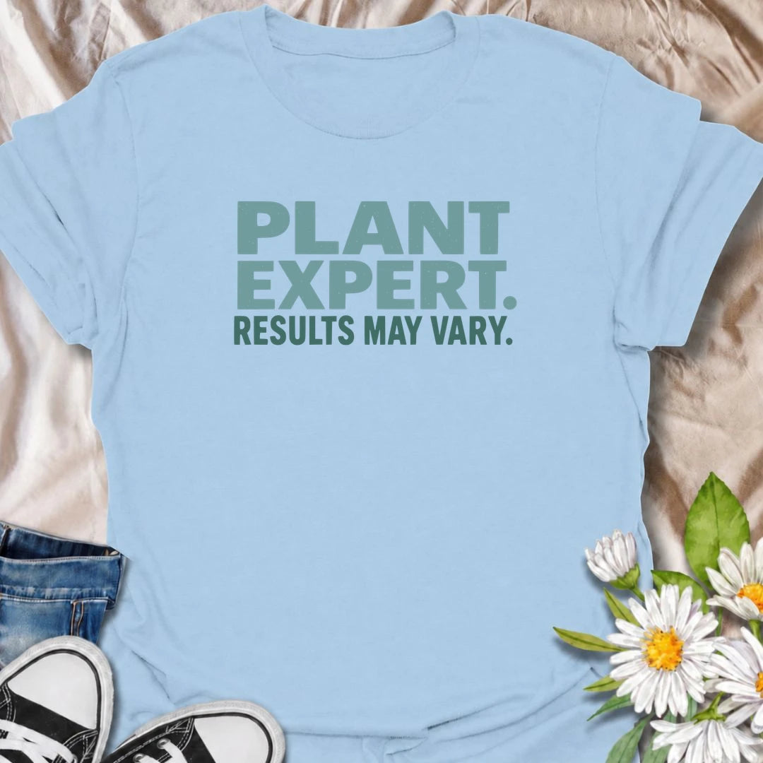 A funny plant T-shirt for anyone who gives great houseplant advice but knows the results are never guaranteed. The phrase “Plant Expert. Results May Vary.” adds dry, self-deprecating humor without overcomplicating the design. Perfect for plant parents, houseplant collectors, indoor gardeners, and anyone who has learned that every plant has a mind of its own. The clean typography makes it an easy everyday shirt and a fun gift for experienced growers and enthusiastic beginners alike. Ideal for nursery trips, 