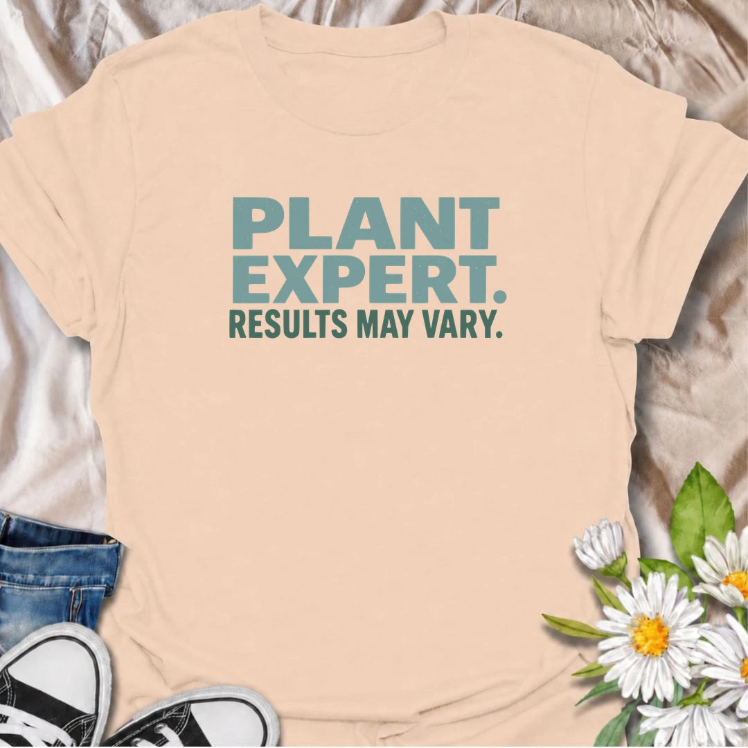 A funny plant T-shirt for anyone who gives great houseplant advice but knows the results are never guaranteed. The phrase “Plant Expert. Results May Vary.” adds dry, self-deprecating humor without overcomplicating the design. Perfect for plant parents, houseplant collectors, indoor gardeners, and anyone who has learned that every plant has a mind of its own. The clean typography makes it an easy everyday shirt and a fun gift for experienced growers and enthusiastic beginners alike. Ideal for nursery trips, 