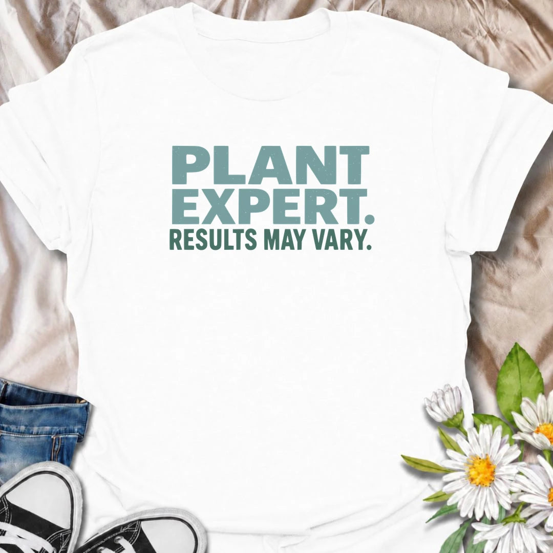 A funny plant T-shirt for anyone who gives great houseplant advice but knows the results are never guaranteed. The phrase “Plant Expert. Results May Vary.” adds dry, self-deprecating humor without overcomplicating the design. Perfect for plant parents, houseplant collectors, indoor gardeners, and anyone who has learned that every plant has a mind of its own. The clean typography makes it an easy everyday shirt and a fun gift for experienced growers and enthusiastic beginners alike. Ideal for nursery trips, 