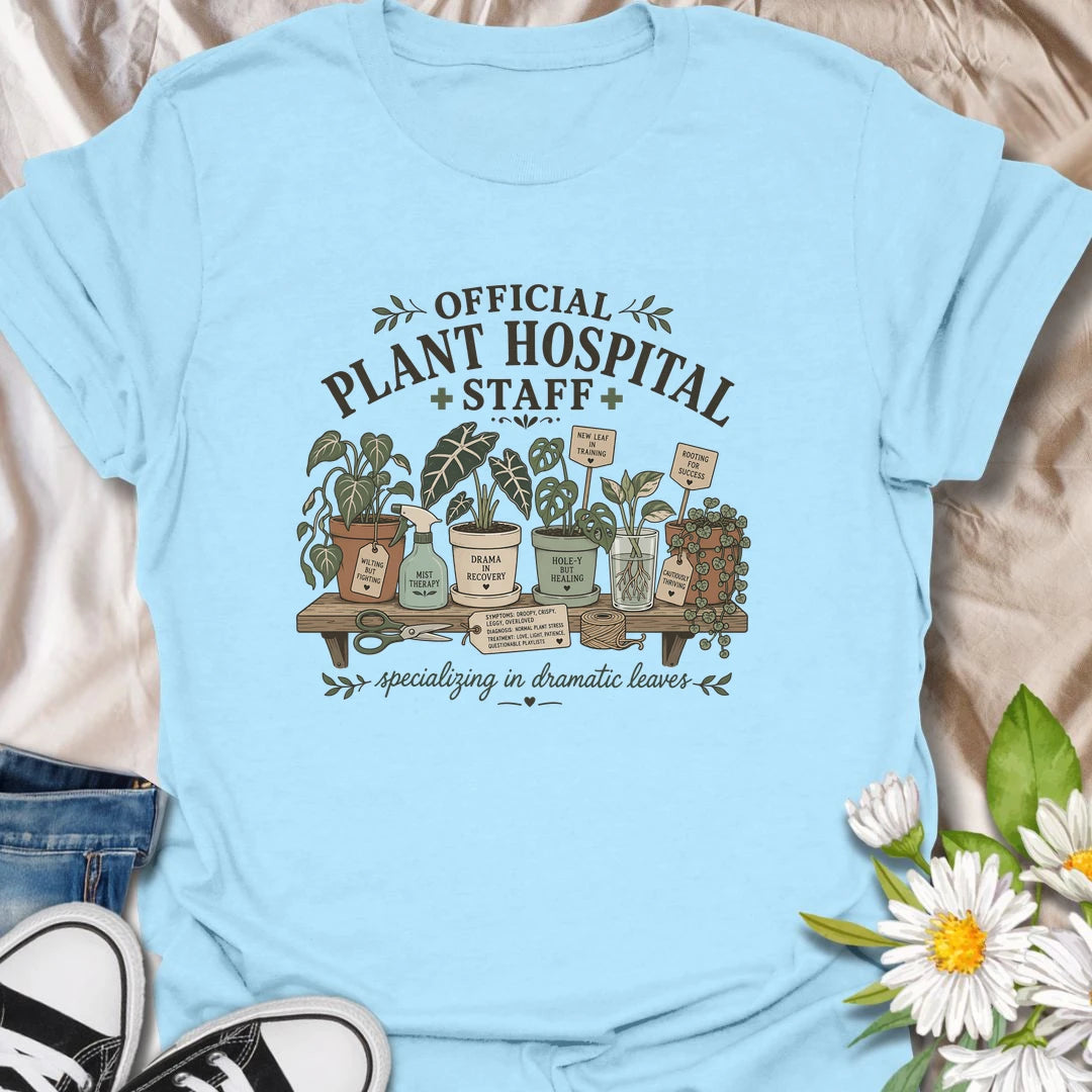 Funny plant lover t-shirt for anyone serving on the official plant hospital staff.
Features dramatic houseplants, propagation cuttings, and plant-care humor in a cozy vintage botanical design.
Perfect for plant parents, houseplant rescuers, and indoor gardeners who specialize in dramatic leaves.