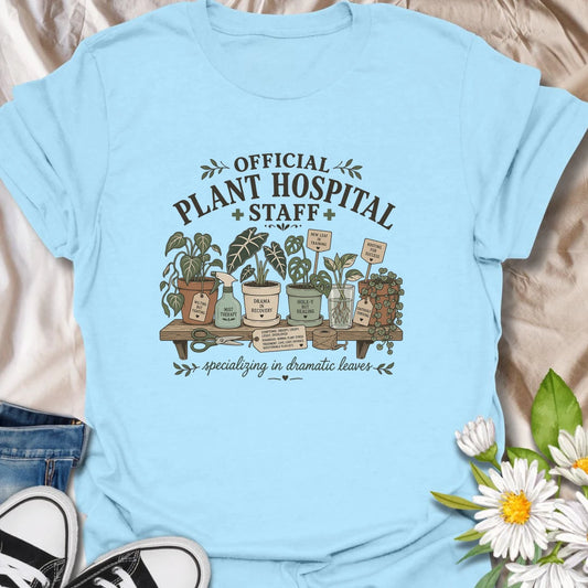 Funny plant lover t-shirt for anyone serving on the official plant hospital staff.
Features dramatic houseplants, propagation cuttings, and plant-care humor in a cozy vintage botanical design.
Perfect for plant parents, houseplant rescuers, and indoor gardeners who specialize in dramatic leaves.