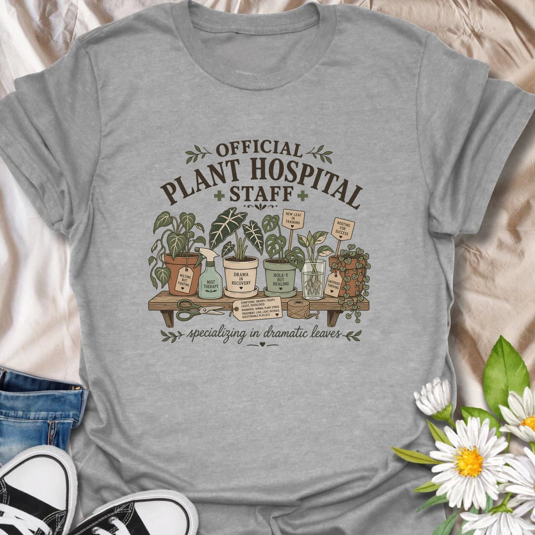 Funny plant lover t-shirt for anyone serving on the official plant hospital staff.
Features dramatic houseplants, propagation cuttings, and plant-care humor in a cozy vintage botanical design.
Perfect for plant parents, houseplant rescuers, and indoor gardeners who specialize in dramatic leaves.