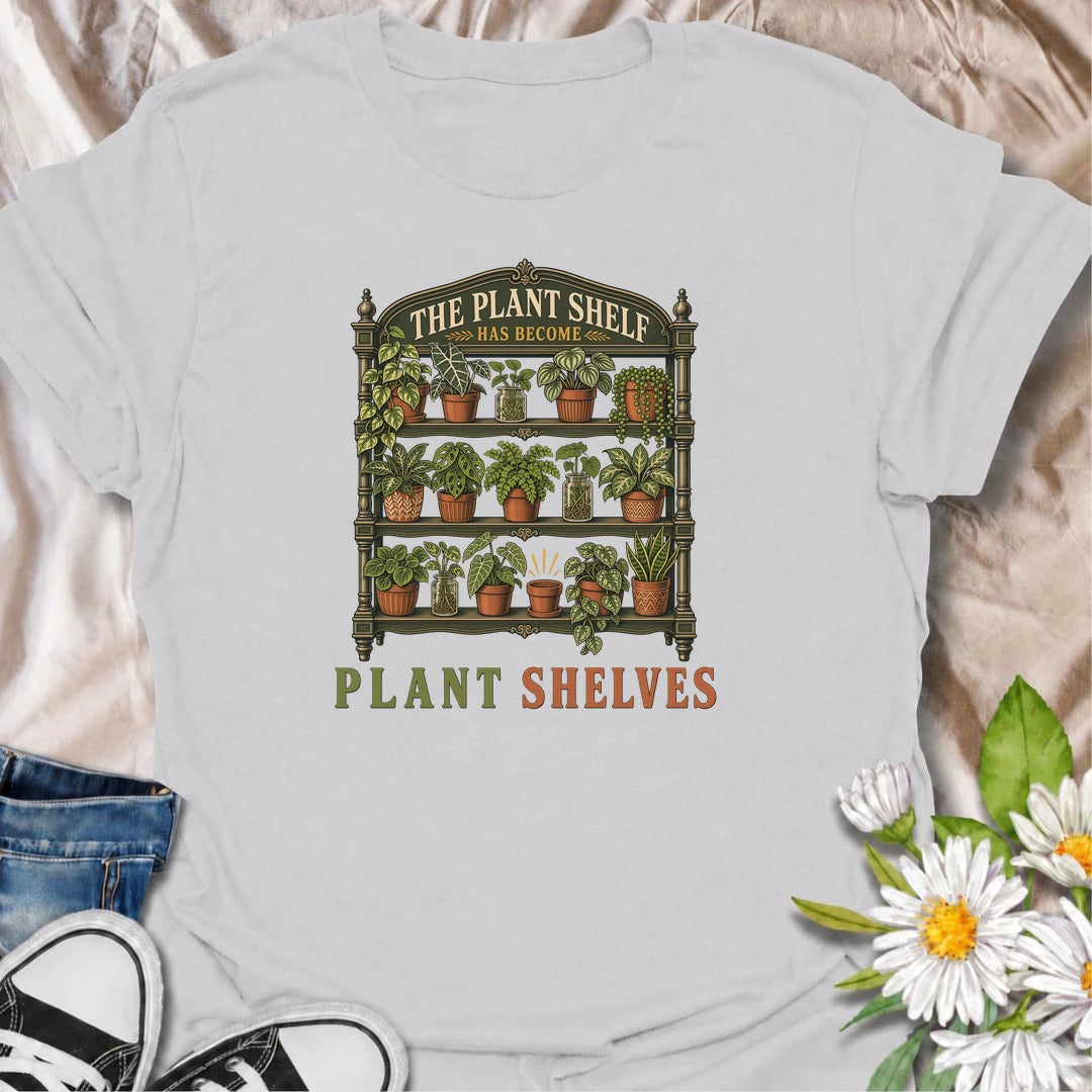 Funny houseplant T-shirt for collectors who started with one small plant shelf and somehow ended up needing several. Featuring a detailed vintage shelving unit packed with houseplants and propagation jars, this design is perfect for indoor gardeners and serious plant collectors.