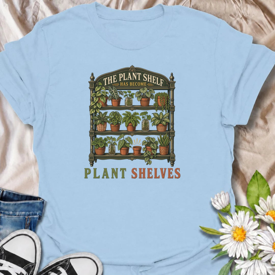 Funny houseplant T-shirt for collectors who started with one small plant shelf and somehow ended up needing several. Featuring a detailed vintage shelving unit packed with houseplants and propagation jars, this design is perfect for indoor gardeners and serious plant collectors.