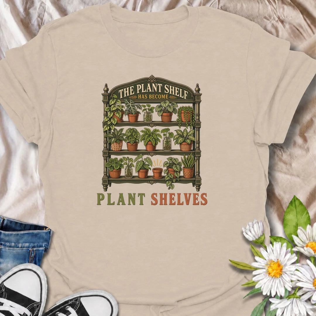 Funny houseplant T-shirt for collectors who started with one small plant shelf and somehow ended up needing several. Featuring a detailed vintage shelving unit packed with houseplants and propagation jars, this design is perfect for indoor gardeners and serious plant collectors.