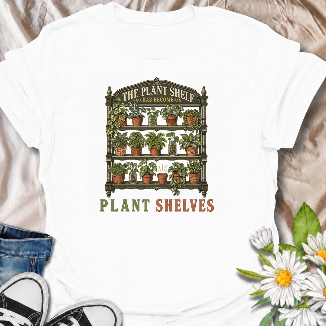 Funny houseplant T-shirt for collectors who started with one small plant shelf and somehow ended up needing several. Featuring a detailed vintage shelving unit packed with houseplants and propagation jars, this design is perfect for indoor gardeners and serious plant collectors.