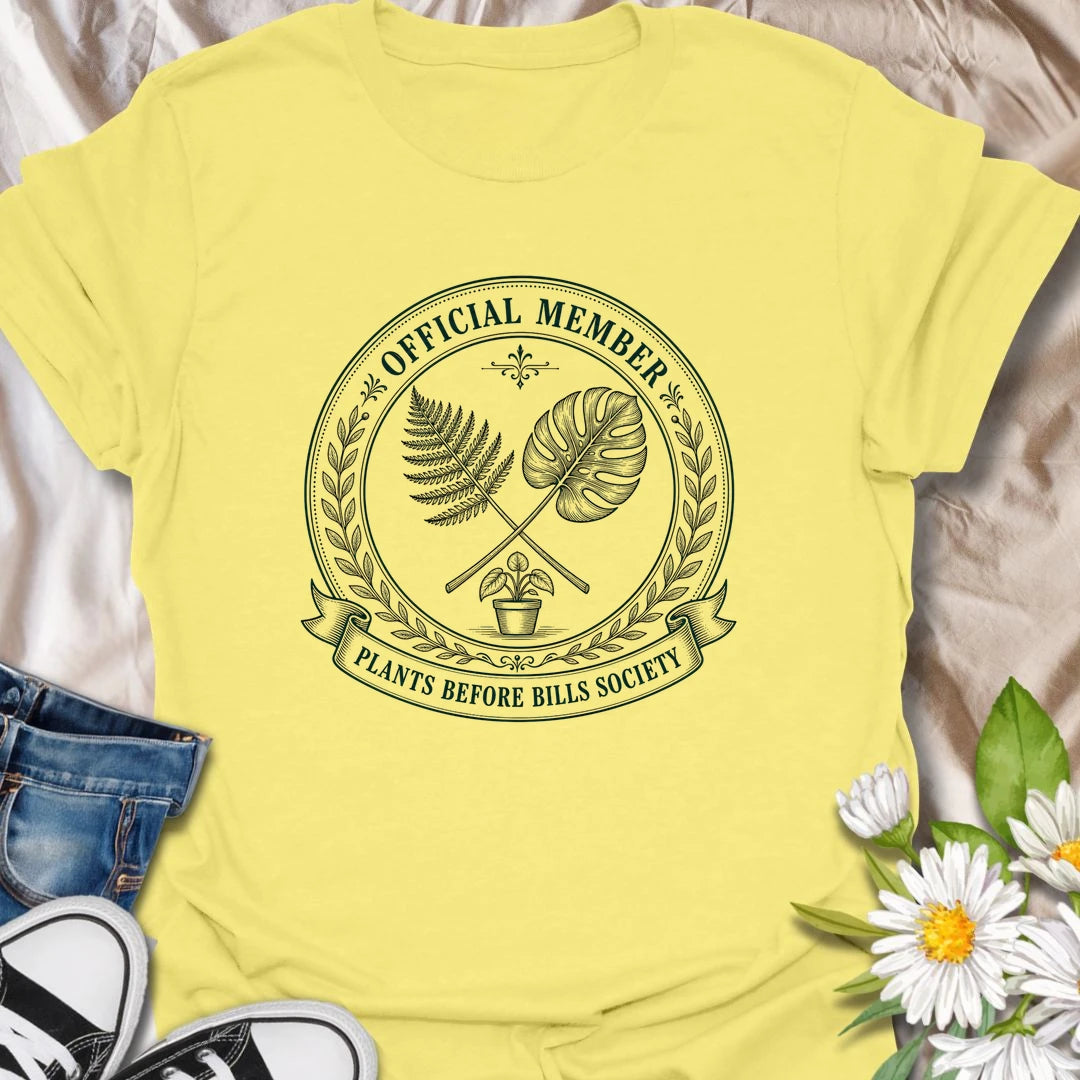 Plants Before Bills t-shirt for plant lovers who know their priorities are leafy, rooted, and usually sitting in a pot.
The official member badge design gives this shirt a vintage botanical society feel with fern, monstera, and potted plant details.
It is perfect for plant moms, houseplant collectors, indoor gardeners, and anyone tempted by plants before responsibilities.
A funny gift for plant people who proudly belong to the plants-before-bills lifestyle.