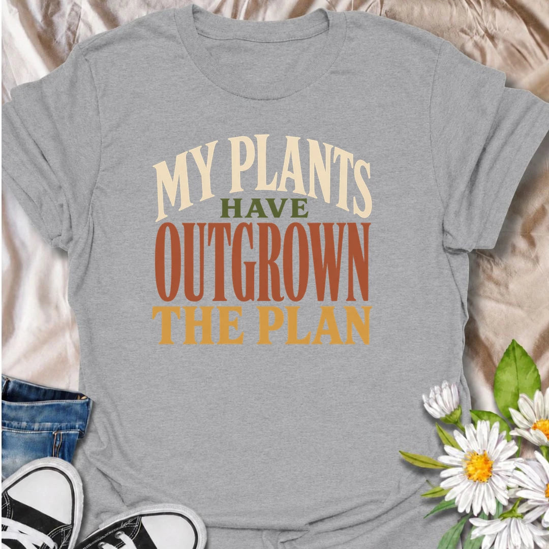 A funny plant T-shirt for anyone whose houseplant collection has grown far beyond the original plan. The phrase “My Plants Have Outgrown the Plan” is perfect for plant parents, indoor gardeners, and collectors who keep finding room for one more. Its bold typography makes the joke easy to read while keeping the design clean and wearable. It makes a great gift for houseplant lovers, pothos fans, and anyone living with an ever-expanding indoor jungle. Ideal for nursery trips, plant swaps, or everyday wear.