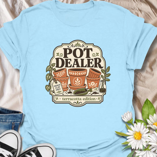 Funny gardening t-shirt with a playful “Pot Dealer” message and charming terracotta pot artwork.
This design is perfect for gardeners, plant lovers, and anyone obsessed with collecting beautiful pots.
A fun gift for plant moms, indoor gardeners, and terracotta lovers.