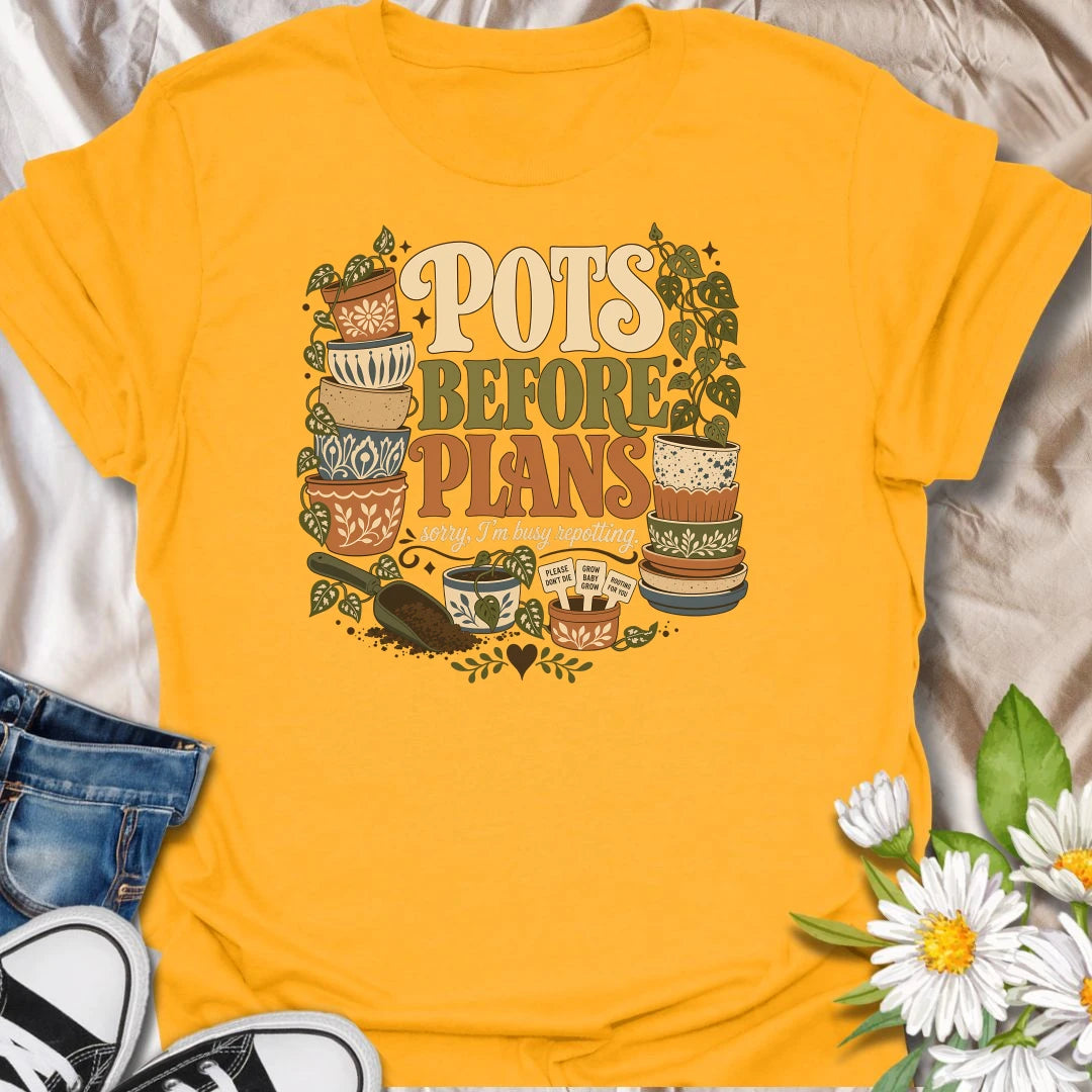 Put repotting first with this playful “Pots Before Plans” T-shirt. Featuring decorative planters, trailing houseplants, potting soil, and tiny plant signs, the design is made for dedicated plant parents. A fun botanical gift for anyone who would happily cancel plans for a repotting session.
