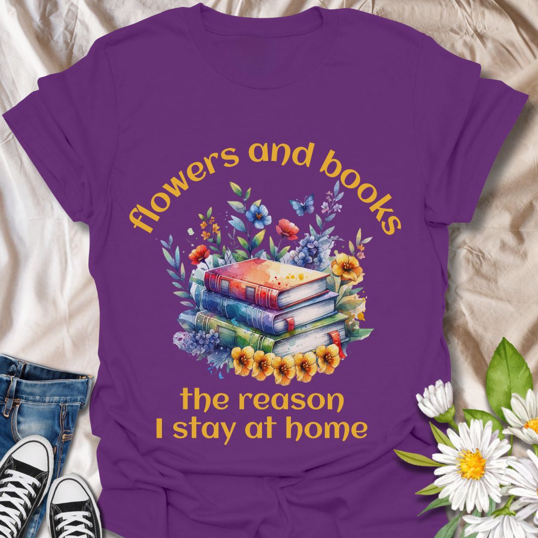 Bookworms and flower lovers unite! This charming t-shirt features a watercolor-style stack of books surrounded by blooms, with the quote “Flowers and books, the reason I stay at home.” A cozy choice for introverts and nature-loving readers.