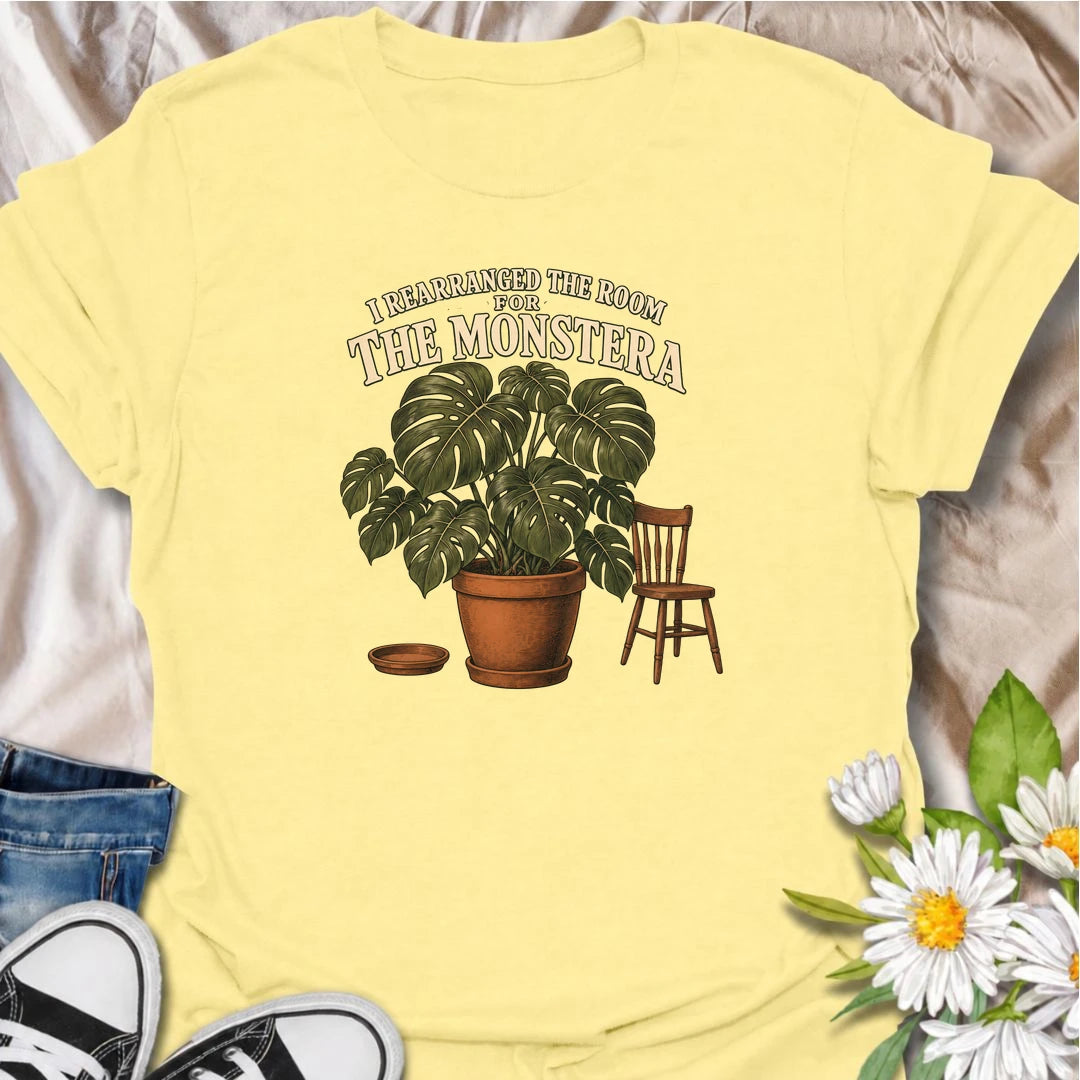 A funny houseplant T-shirt for anyone who has ever reorganized an entire room just to make one plant fit better. Featuring an oversized monstera beside a simple chair, this design is perfect for plant parents who know the furniture sometimes has to adapt to the greenery. The phrase “I Rearranged the Room for the Monstera” captures the reality of living with a rapidly growing indoor jungle. It makes a great gift for monstera lovers, houseplant collectors, and anyone who plans their home around their plants. 