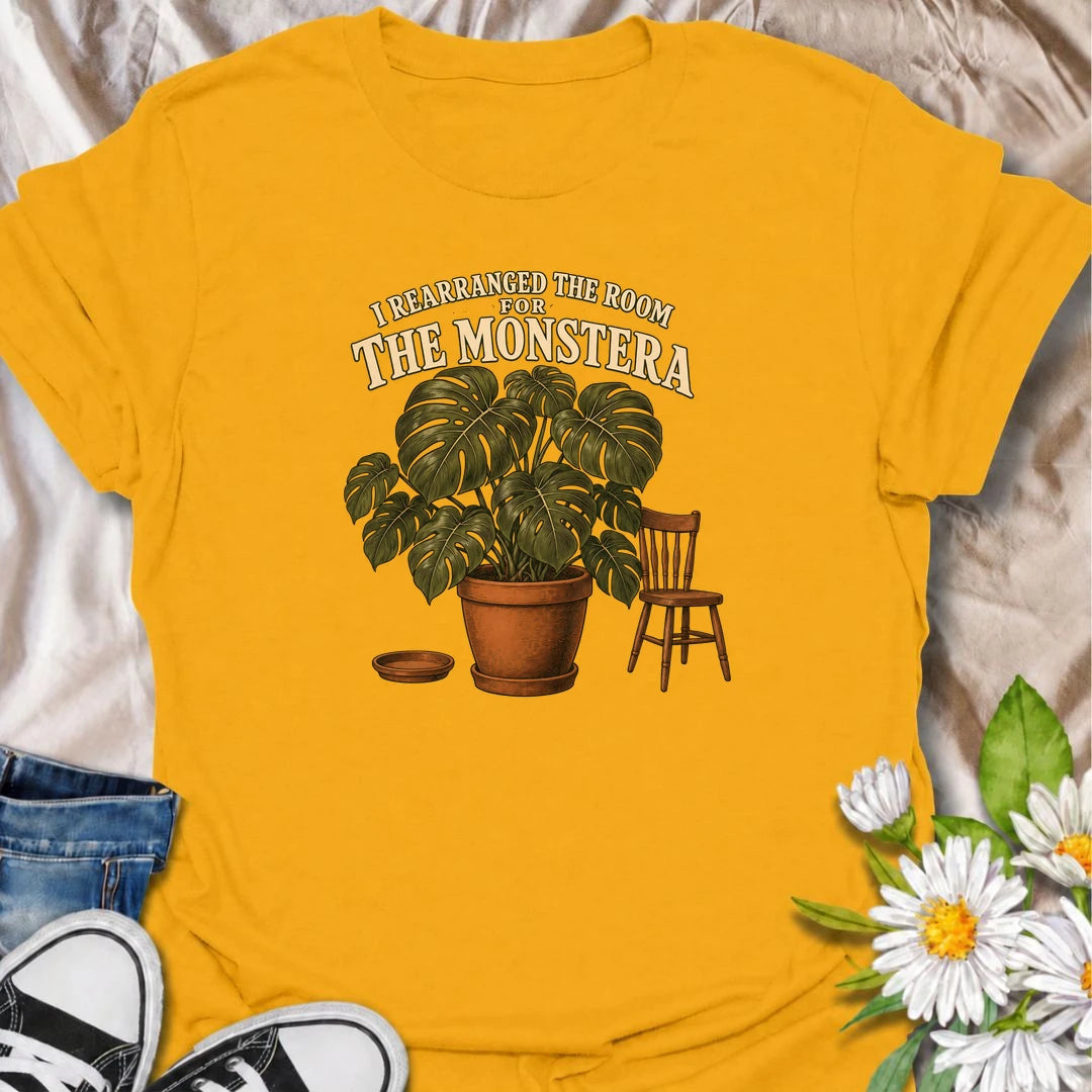 A funny houseplant T-shirt for anyone who has ever reorganized an entire room just to make one plant fit better. Featuring an oversized monstera beside a simple chair, this design is perfect for plant parents who know the furniture sometimes has to adapt to the greenery. The phrase “I Rearranged the Room for the Monstera” captures the reality of living with a rapidly growing indoor jungle. It makes a great gift for monstera lovers, houseplant collectors, and anyone who plans their home around their plants. 