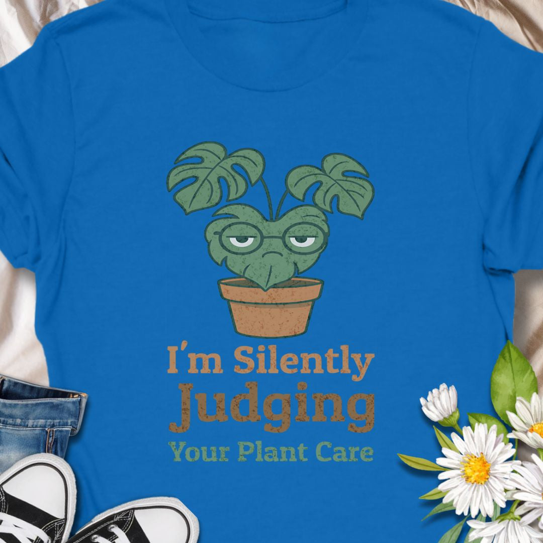 Calling all sassy plant parents – this “I'm Silently Judging Your Plant Care” tee is made for you! Featuring a moody monstera in a pot, it’s perfect for green thumbs who have high standards and a sense of humor. Ideal gift for plant moms, plant dads, and houseplant snobs alike!