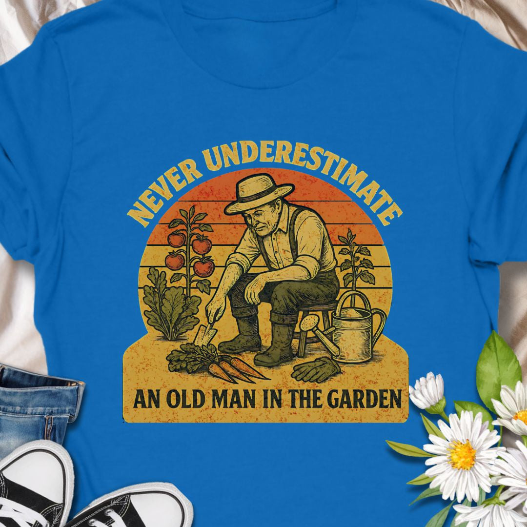 Celebrate gardening wisdom with this “Never Underestimate an Old Man in the Garden” tee featuring a retro-style illustration of a seasoned gardener harvesting his crops. A funny and heart warming shirt for grandpas, dads, or any experienced grower who takes pride in their garden. Makes a thoughtful gift for Father’s Day or retirement.