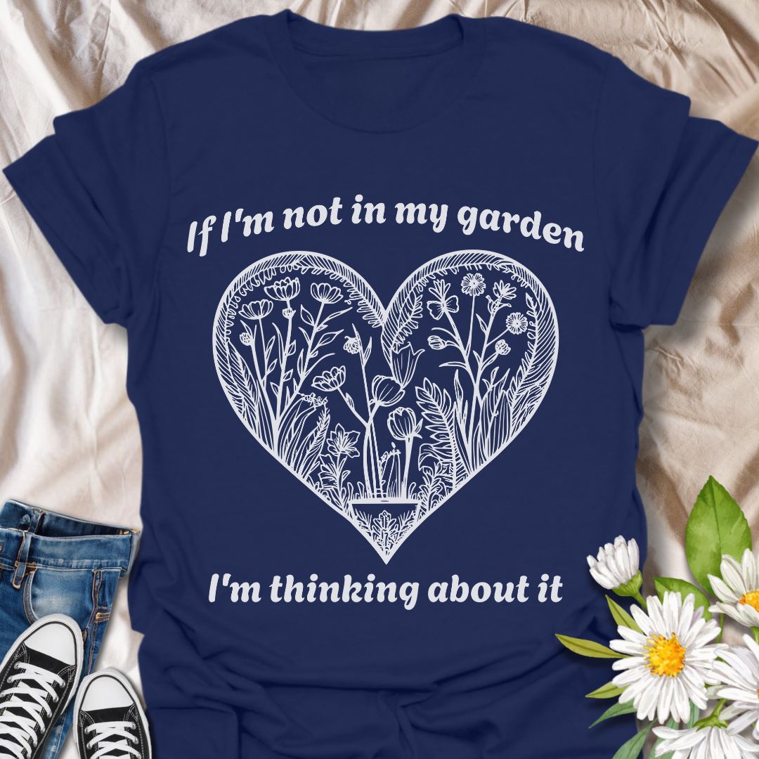 Show off your gardening passion with this beautifully illustrated heart-shaped floral design. Featuring the phrase “If I'm not in my garden, I'm thinking about it,” this shirt is perfect for plant lovers who dream of dirt, blooms, and backyard bliss.