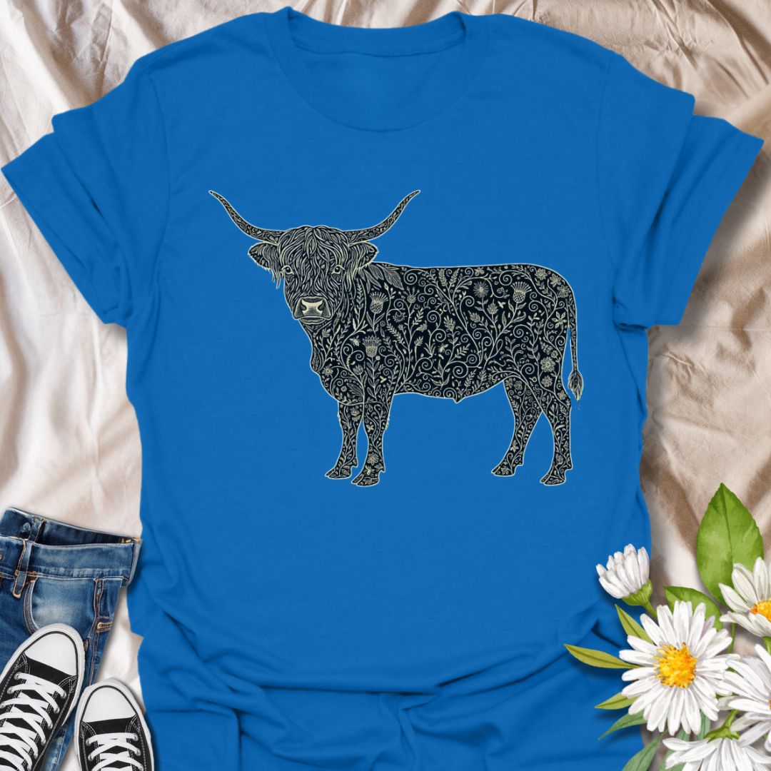 Show off your love for rustic charm and artistic nature with this intricately designed Highland cow graphic t-shirt. Featuring a beautifully detailed floral pattern within the iconic silhouette of a Highland cow, this design is perfect for farm lovers, botanical art fans, and anyone who appreciates country-inspired fashion with a creative twist.