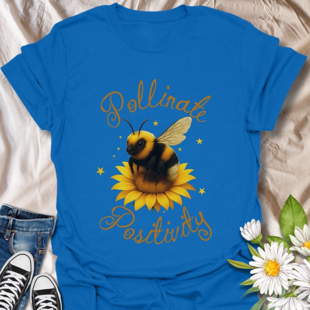 Pollinate Positivity t-shirt featuring a cute bumblebee on a bright sunflower, spreading good vibes and positive energy. Perfect bee lover shirt, nature-inspired graphic tee, gardening gift, or summer aesthetic outfit. Soft, lightweight, and ideal for women, teens, or anyone who loves bees, sunflowers, and inspirational quotes