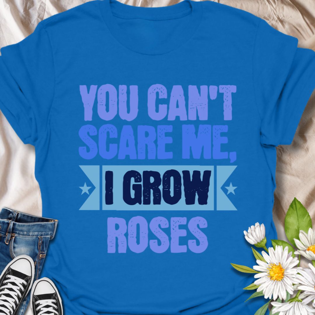 Show off your fearless green thumb with this bold "You Can't Scare Me, I Grow Roses" t-shirt. Designed for confident gardeners and rose enthusiasts who know the thorny truth of growing beauty. A perfect gift for plant lovers who aren’t afraid of a few pricks!