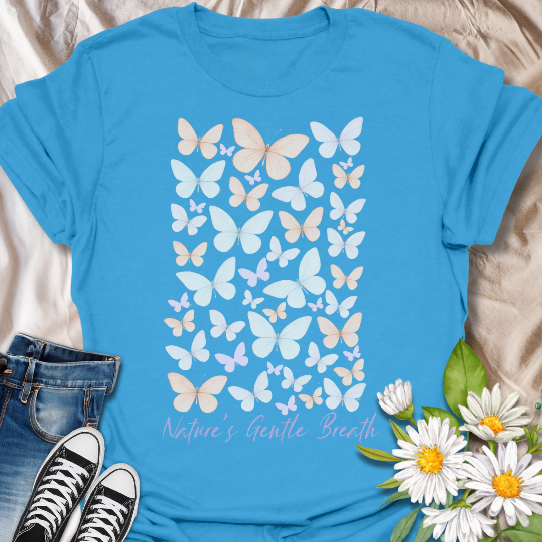 Soft pastel butterfly t-shirt with calming peach, lilac, and ivory tones and the phrase “Nature’s Gentle Breath.” A peaceful, nature-loving design perfect for mindful souls, butterfly fans, and lovers of quiet beauty.