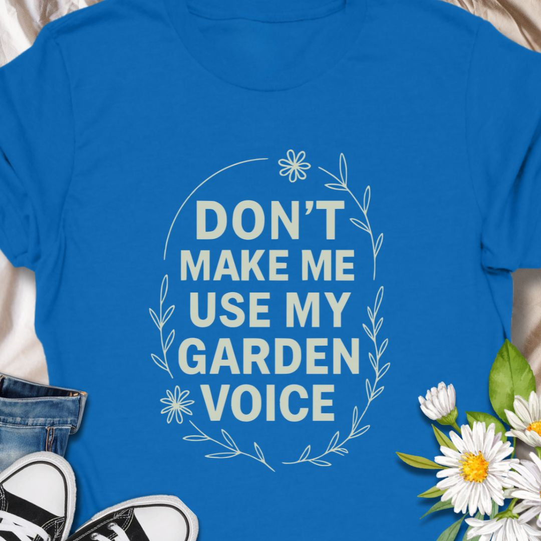 Let your garden attitude bloom with this funny “Don’t Make Me Use My Garden Voice” t-shirt. Ideal for gardeners who aren’t afraid to speak their mind—or to shout over the hedge! This tee makes a perfect gift for plant moms, green thumbs, or anyone who runs on coffee and compost.