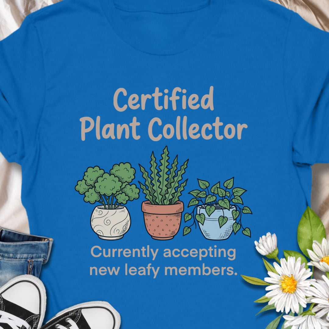 Show off your green thumb with this “Certified Plant Collector” t-shirt featuring charming potted plants and the phrase “Currently accepting new leafy members.” Perfect for plant parents, indoor jungle enthusiasts, or anyone who can’t resist bringing home another plant. A cozy and fun gift for birthdays or plant swaps.