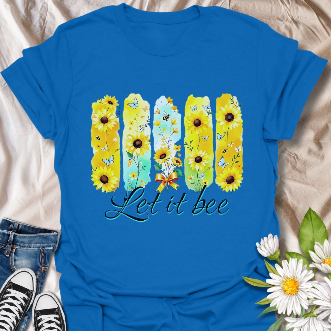Bright sunflower t-shirt with bees and butterflies and the playful phrase "Let it bee." Perfect for nature lovers, bee enthusiasts, gardeners, and wildflower fans who appreciate pollinators. Fun spring and summer tee celebrating positivity and nature’s beauty. Royal blue