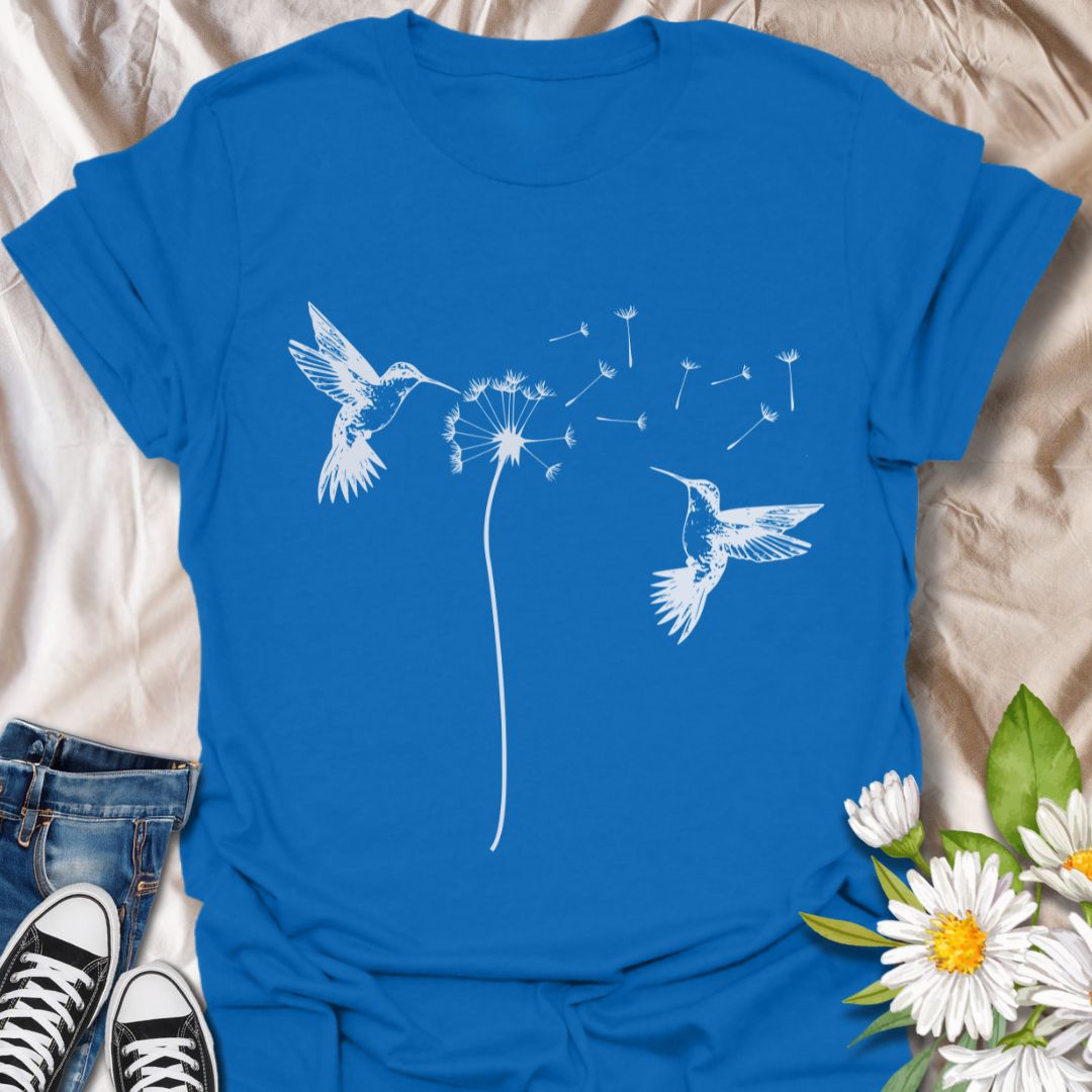 Capture the beauty of nature with this elegant design featuring hummingbirds and dandelion seeds drifting on the breeze. A perfect gift for bird lovers, gardeners, and anyone who loves peaceful, nature-inspired art.