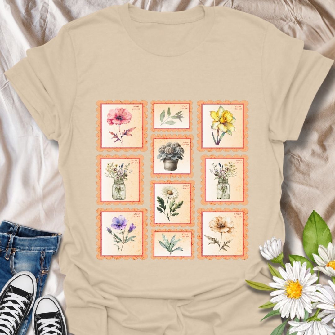 Vintage floral postage stamp t-shirt featuring watercolor botanical prints framed like charming retro stamps. Perfect for flower lovers, gardeners, cottagecore fans, and nature-inspired fashion. Ideal gift for plant moms, wildflower enthusiasts, and those who adore vintage aesthetics