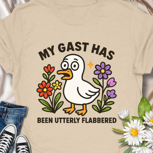 Wake up people’s days with a tee that’s equal parts silly and sweet.  Humor meets floral fun in  this adorable tee featuring a cheerful cartoon duck, and bright wildflowers do the talking  "My Gast Has Been Utterly Flabbered" - Hilarious and adorable.
Wake up people’s days with a tee that’s equal parts silly and sweet. 