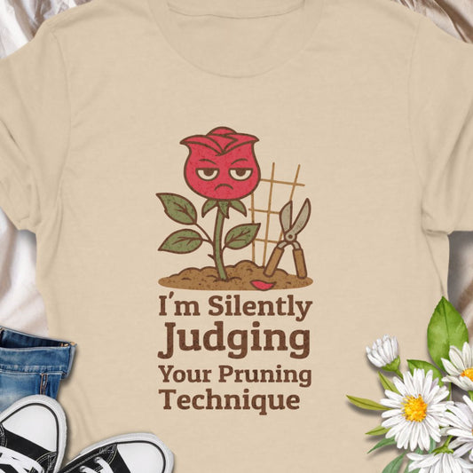 Bring humor to the garden with this “I’m Silently Judging Your Pruning Technique” shirt featuring a sassy red rose. Perfect for gardeners who love their plants trimmed just right and have a sense of humor to match. Makes a great gift for plant lovers and gardening enthusiasts.