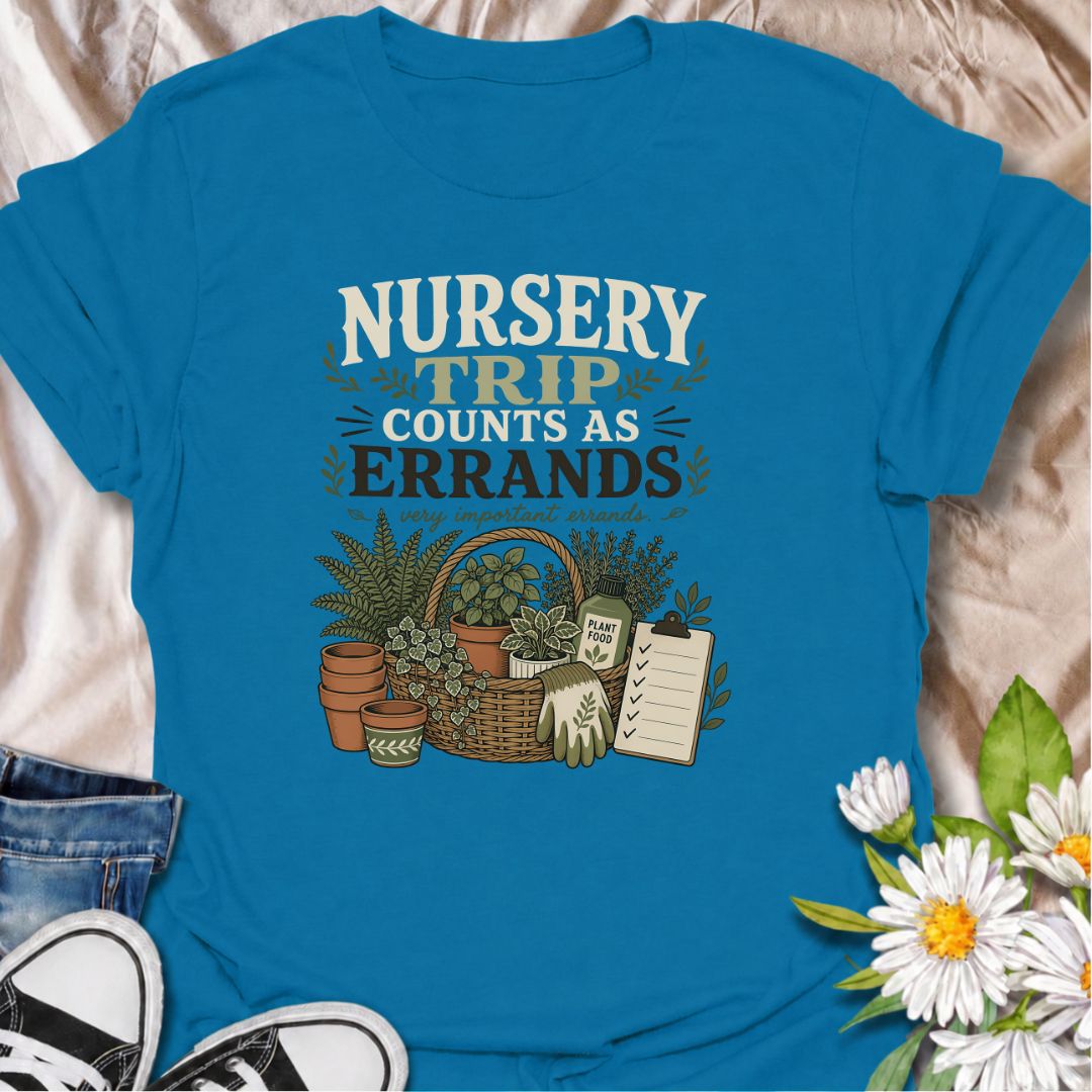Make every plant-shopping trip feel productive with this “Nursery Trip Counts as Errands” T-shirt. The detailed basket of herbs, pots, garden supplies, and checklist celebrates a gardener’s most important appointments. It is a fun gift for plant lovers who always make time for the nursery.