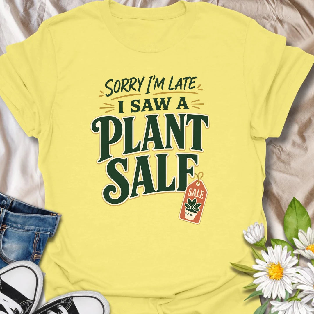 Plant Sale t-shirt for anyone who cannot be trusted around discounted greenery.
The bold retro text and sale tag design make this a funny choice for houseplant shoppers and garden center regulars.
It is perfect for plant moms, plant collectors, and indoor gardeners who are always late because they saw another plant.
A fun gift for plant lovers who know a plant sale is a perfectly valid reason to change plans.