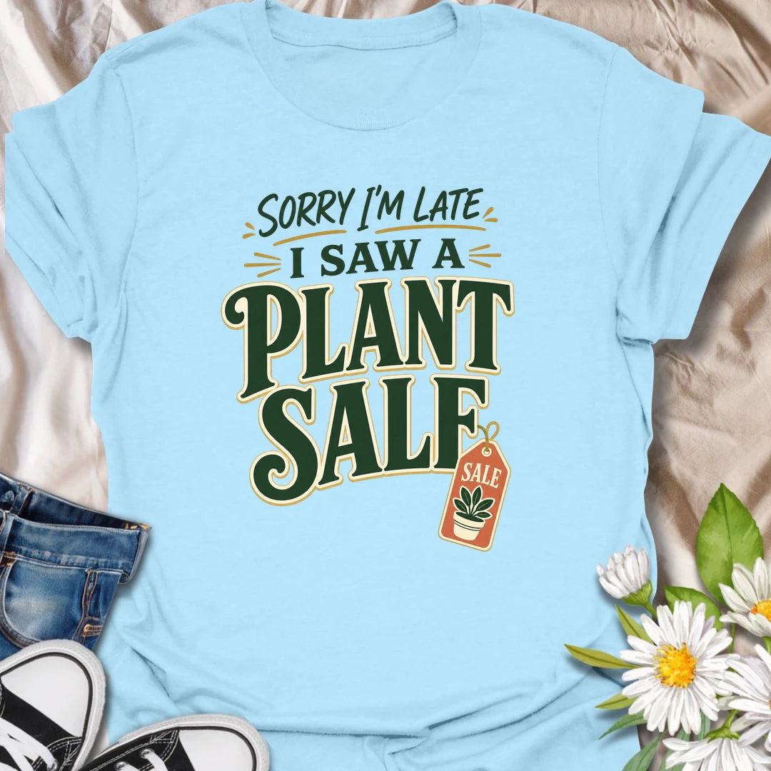 Plant Sale t-shirt for anyone who cannot be trusted around discounted greenery.
The bold retro text and sale tag design make this a funny choice for houseplant shoppers and garden center regulars.
It is perfect for plant moms, plant collectors, and indoor gardeners who are always late because they saw another plant.
A fun gift for plant lovers who know a plant sale is a perfectly valid reason to change plans.