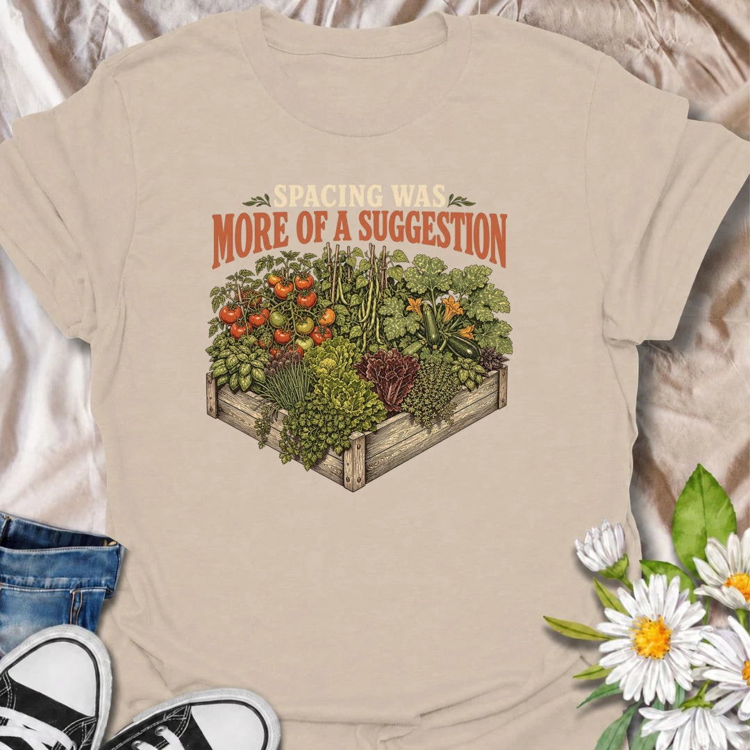 A funny gardening T-shirt for anyone who treats recommended plant spacing as more of a guideline than a rule. Featuring an overflowing raised garden bed packed with tomatoes, greens, herbs, and vegetables, this design is perfect for enthusiastic backyard growers. The phrase “Spacing Was More of a Suggestion” captures the familiar chaos of squeezing in just one more plant. It makes a great gift for vegetable gardeners, raised-bed growers, and anyone who loves a densely planted garden. Ideal for garden days, 