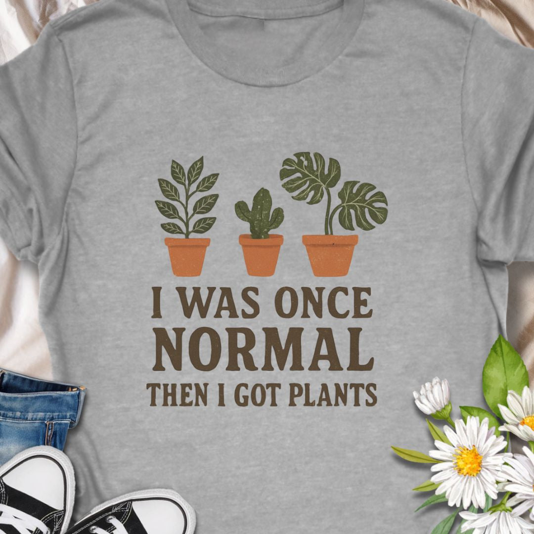 Show off your leafy obsession with this hilarious “I Was Once Normal Then I Got Plants” t-shirt. A perfect gift for plant moms, dads, and anyone who’s proud of their growing green collection—because normal is overrated when you’ve got houseplants!