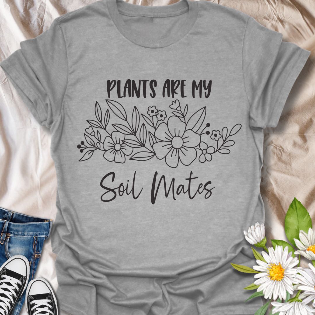 Funny gardening t-shirt with “Plants Are My Soil Mates” quote and floral line art. Perfect gift for plant lovers, garden enthusiasts, nature fans, plant moms, and anyone who loves wordplay, puns, and botanical humor. Ideal for plant parents and green thumb friends.