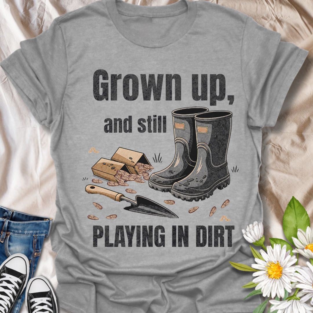 Playfully nostalgic gardening shirt with boots, seeds, and trowel artwork. Ideal for grown-up gardeners who still love getting their hands dirty. A perfect gift for plant lovers with a sense of humor.