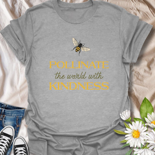 Spread positivity with this uplifting graphic t-shirt featuring a bee illustration and the inspiring phrase "Pollinate the World with Kindness." Perfect for nature lovers, pollinator supporters, and anyone who values kindness, growth, and eco-friendly living.