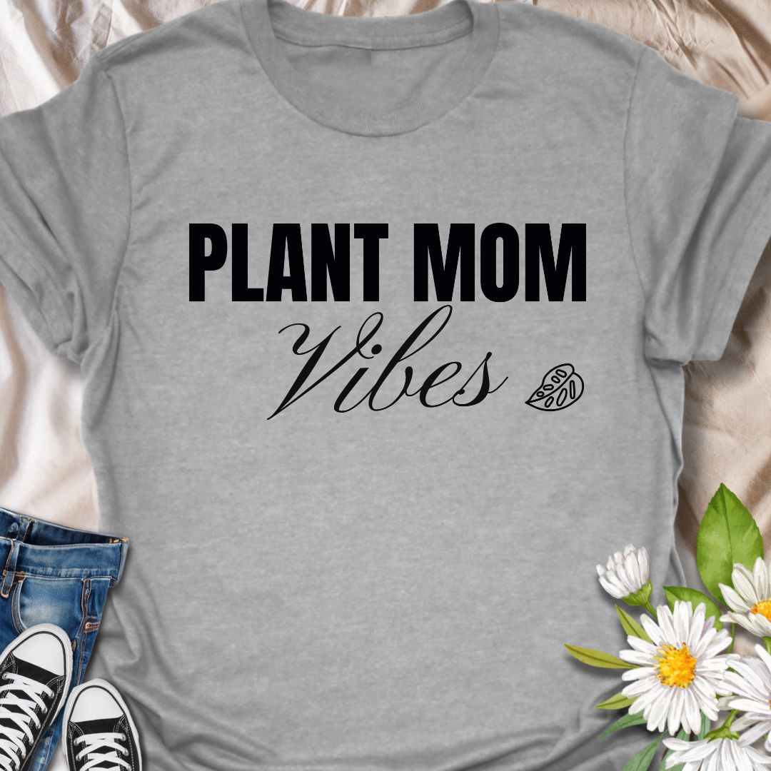 Celebrate your nurturing nature with this adorable “Plant Mom Vibes” t-shirt. Whether you’re tending to your houseplants or just vibing with your leafy family, this tee is perfect for proud plant moms and botanical beauties. Makes a thoughtful gift for birthdays, Mother's Day, or plant-obsessed friends.
