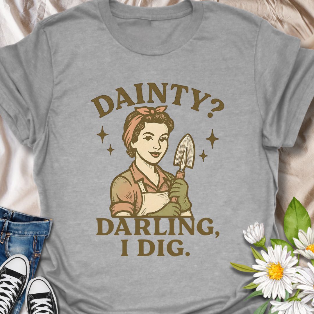 Celebrate strong, sassy gardeners with this vintage-inspired "Dainty? Darling, I Dig" t-shirt. Featuring a retro woman holding a garden trowel, this funny and empowering design is perfect for plant lovers, backyard growers, and proud dirt diggers who aren't afraid to get their hands dirty. A great gift for gardening moms, grandmas, or any green-thumbed queen with attitude.
