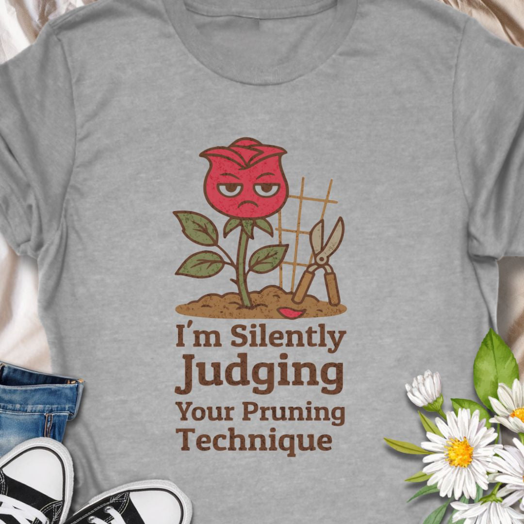 Bring humor to the garden with this “I’m Silently Judging Your Pruning Technique” shirt featuring a sassy red rose. Perfect for gardeners who love their plants trimmed just right and have a sense of humor to match. Makes a great gift for plant lovers and gardening enthusiasts.