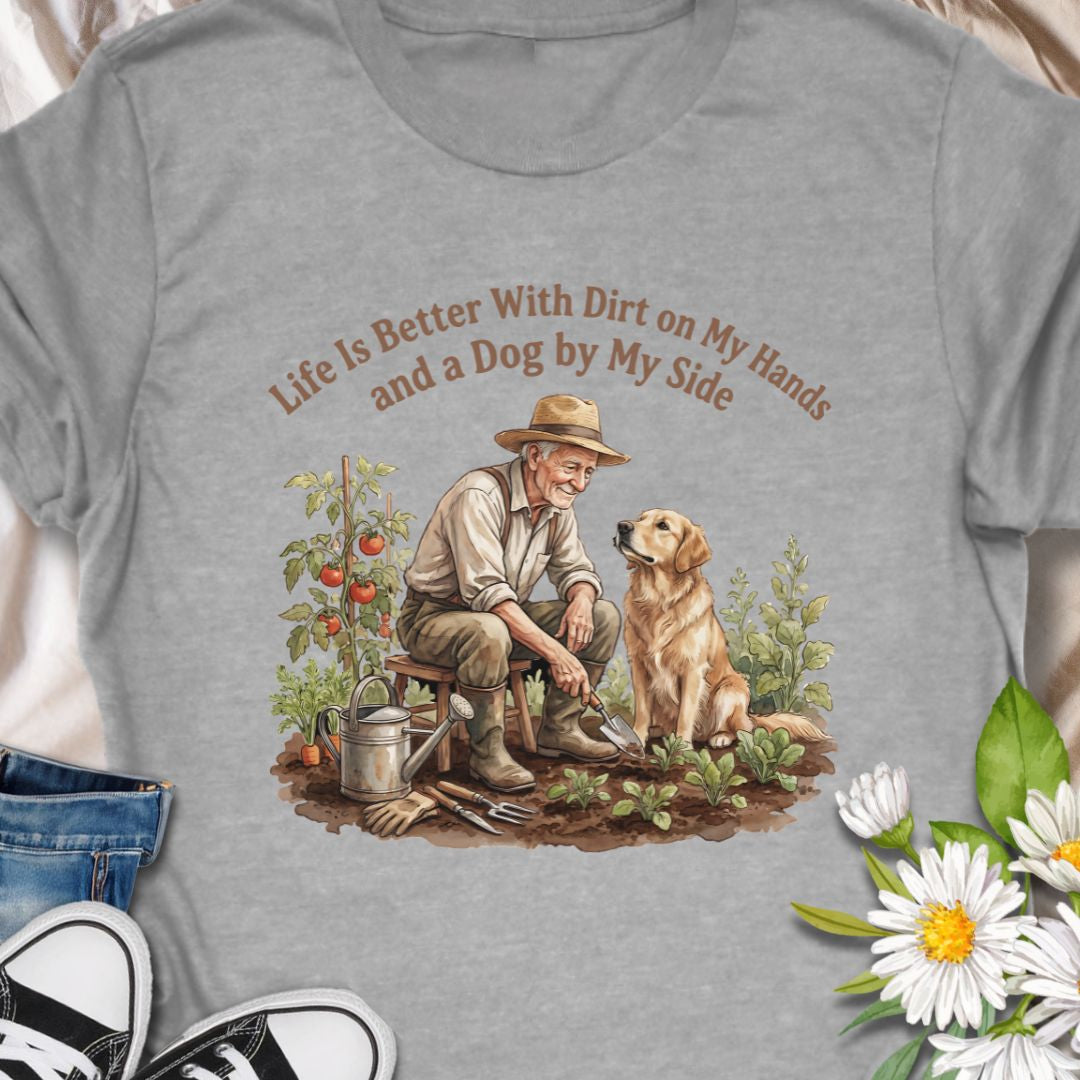 Celebrate the joys of gardening and loyal companionship with this heart warming “Life Is Better With Dirt on My Hands and a Dog by My Side” t-shirt. Featuring a vintage-style illustration of a man and his dog in the garden, this tee is perfect for nature lovers, dog dads, or anyone who finds peace in plants and paws. A thoughtful gift for birthdays, Father’s Day, or just because.