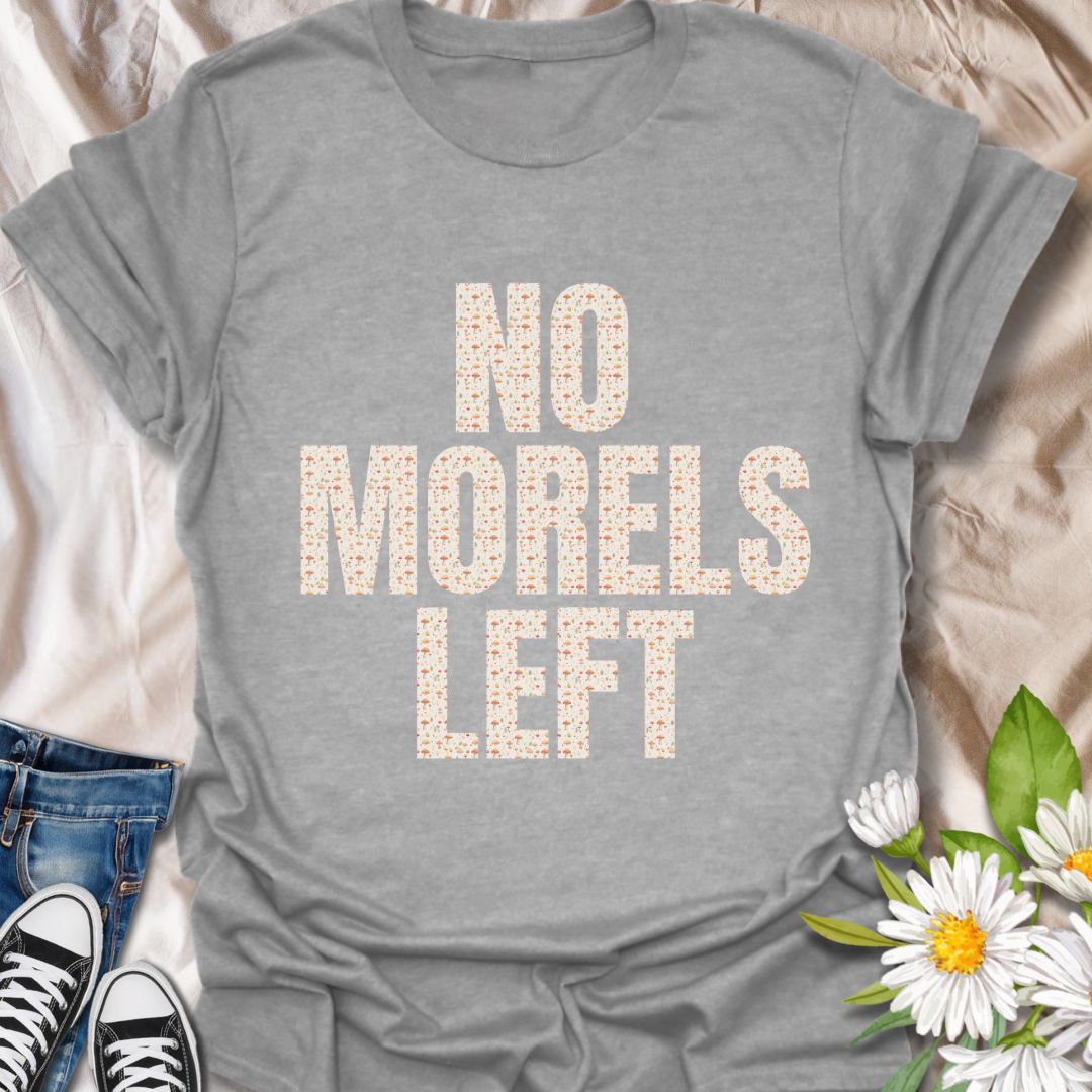 Show off your mushroom humor with this fun graphic t-shirt featuring the clever phrase "No Morels Left" which has mushroom designs within the letters.  Perfect for mushroom hunters, fungi enthusiasts, gardeners, and anyone who enjoys witty nature-inspired apparel.