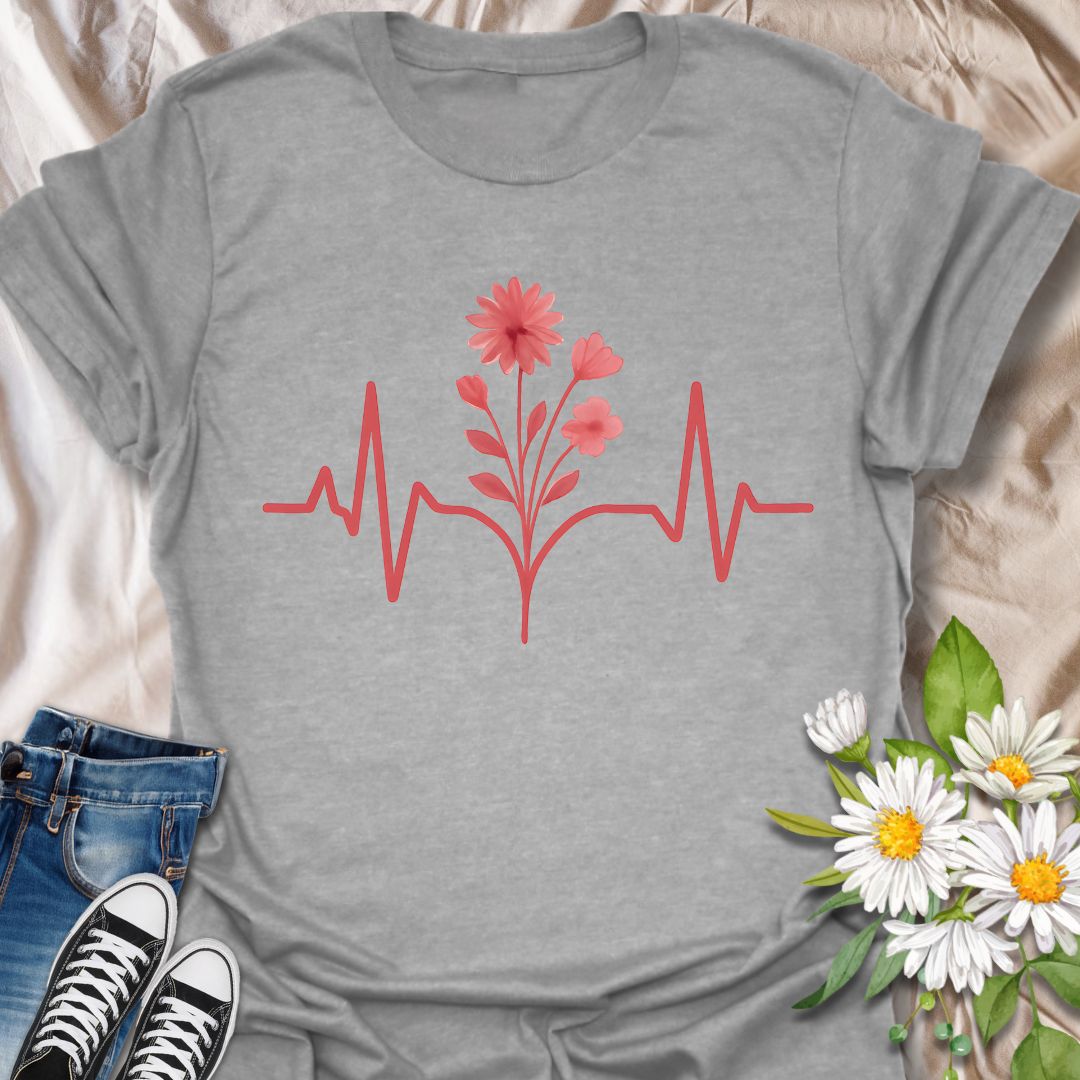 Minimalist flower heartbeat t-shirt featuring a soft red floral stem growing from a heart rhythm line. A meaningful, nature-meets-wellness design ideal for nurses, plant lovers, and anyone who feels alive in nature. Great gift for healthcare heroes, garden lovers, and flower fans alike