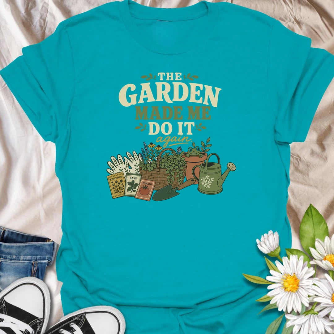 Blame the garden with this playful “The Garden Made Me Do It Again” T-shirt. Featuring gardening gloves, seed packets, a flower basket, watering can, and a curious frog, it captures the irresistible pull of another garden project. A fun choice for gardeners, plant lovers, and enthusiastic seed shoppers.