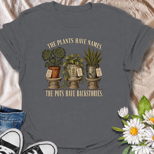 A funny houseplant T-shirt for plant parents who know every plant’s name and every pot’s backstory. Perfect for collectors with dramatic greenery.