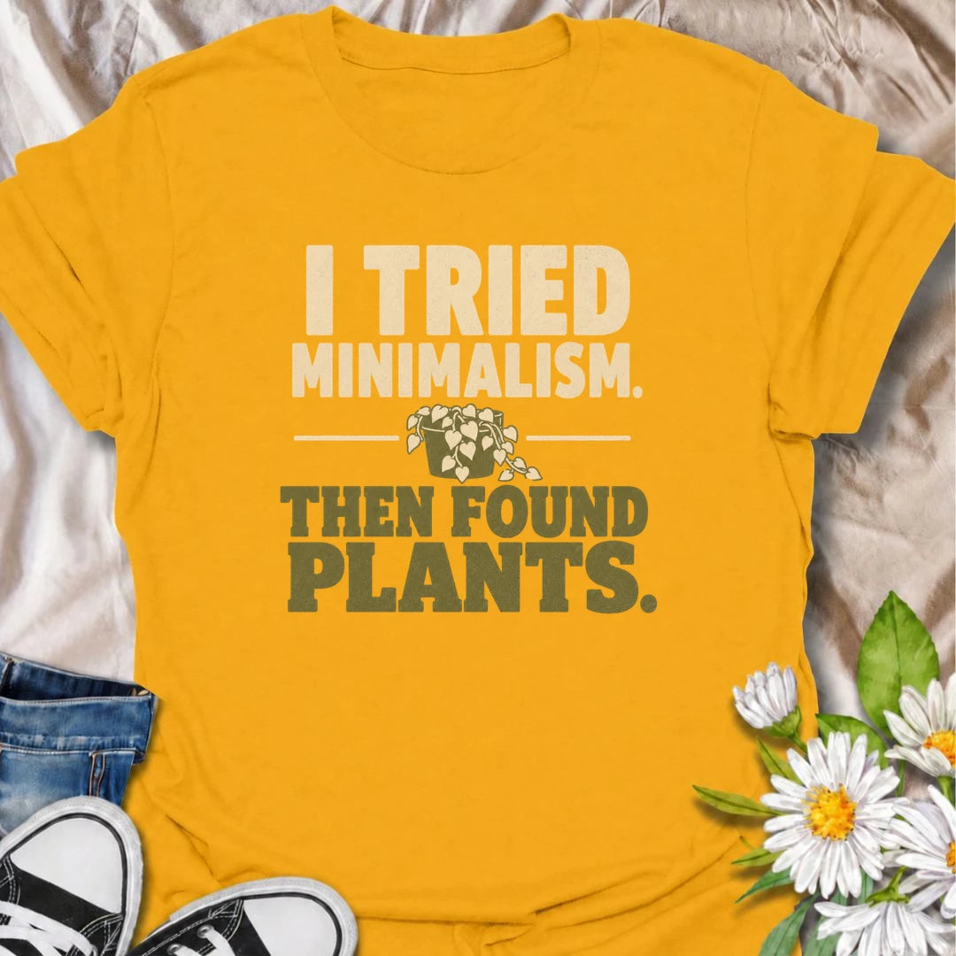 A funny plant T-shirt for anyone who tried to embrace minimalism and immediately got distracted by houseplants. The phrase “I Tried Minimalism. Then Found Plants.” is perfect for plant collectors, indoor gardeners, and anyone whose shelves somehow keep getting greener. It makes a great gift for houseplant lovers with a dry sense of humor and very little empty space left at home. A simple, bold botanical design that works especially well for everyday casual wear. Ideal for plant parents, pothos fans, and pro