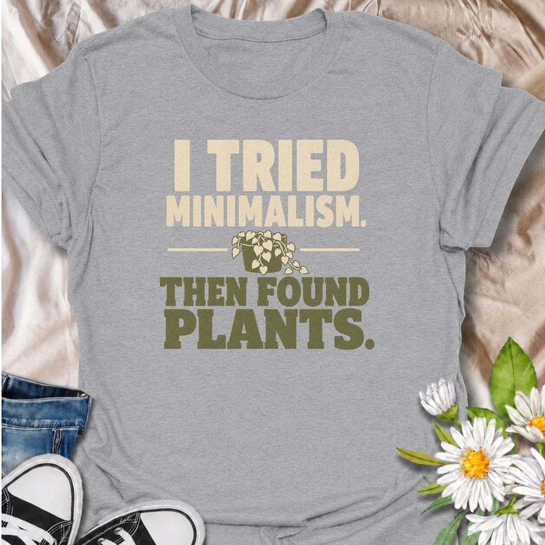 A funny plant T-shirt for anyone who tried to embrace minimalism and immediately got distracted by houseplants. The phrase “I Tried Minimalism. Then Found Plants.” is perfect for plant collectors, indoor gardeners, and anyone whose shelves somehow keep getting greener. It makes a great gift for houseplant lovers with a dry sense of humor and very little empty space left at home. A simple, bold botanical design that works especially well for everyday casual wear. Ideal for plant parents, pothos fans, and pro