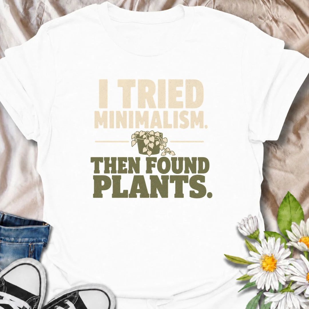 A funny plant T-shirt for anyone who tried to embrace minimalism and immediately got distracted by houseplants. The phrase “I Tried Minimalism. Then Found Plants.” is perfect for plant collectors, indoor gardeners, and anyone whose shelves somehow keep getting greener. It makes a great gift for houseplant lovers with a dry sense of humor and very little empty space left at home. A simple, bold botanical design that works especially well for everyday casual wear. Ideal for plant parents, pothos fans, and pro